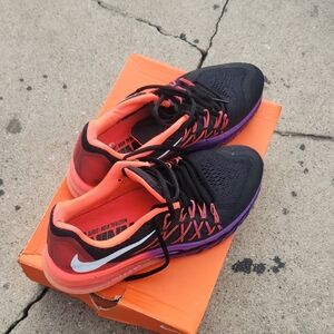 Nike Black and Pink Athletic Shoes Modern Performance